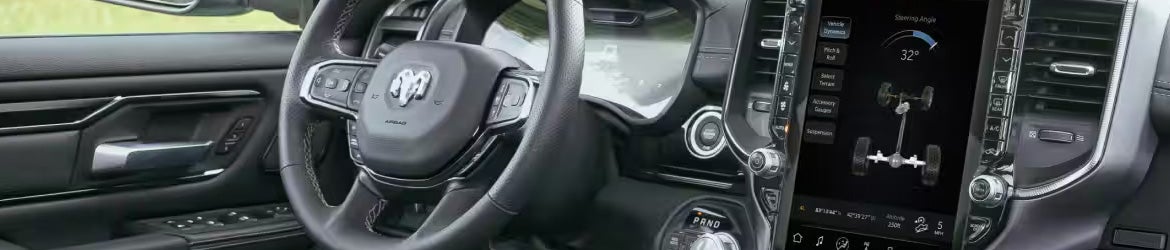 2026 RAM 1500 push-button start and interior controls in Springfield, MI